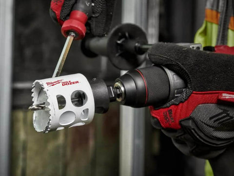 Milwaukee bi-metal hole saw, 3-3/4 in, attached to a drill