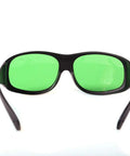 Top Shelf Laser Safety Glasses Delivering Knockout Eye Protection For 635Nm 808Nm And 980Nm Diodes with green lenses and sturdy black frame.