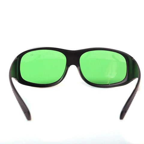 Top Shelf Laser Safety Glasses Delivering Knockout Eye Protection For 635Nm 808Nm And 980Nm Diodes with green lenses and sturdy black frame.