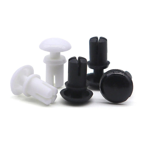 Heavy Duty Nylon Push Button Rivets And Insulated Snap Fasteners For PC Boards Lock Down Gear Smoothly While This Workhorse Plastic Expansion Rivet Insert Kit display of black and white nylon rivets.