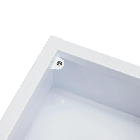 CUBIX SAFETY AED cabinet interior corner, white metal frame with visible screw fastener.