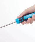 Hand holding a blue magnetic screwdriver with a screw attached, from the Magnetic Screwdriver Set 29 Piece With Assorted Bits Including Phillips Slotted Star Hex And Square Magnetizer Demagnetizer And Storage Case All In One Home Repair Hand Tool Kit For Quick Fixes And Everyday Projects.