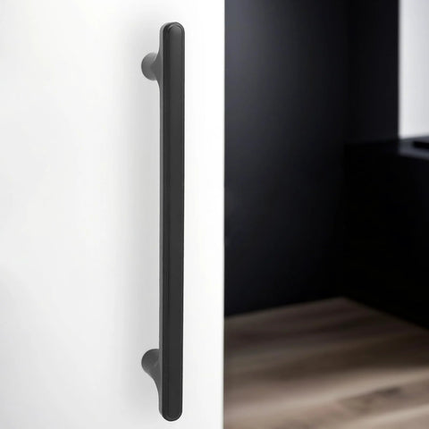 5 Inch Cabinet Pulls Matte Black Zinc Alloy Drawer Pulls 10 Pack, installed on a white cabinet door, showing sleek modern style.