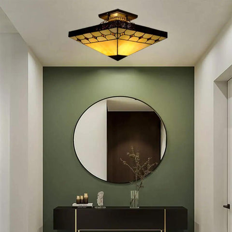 Tiffany Style Two Light Craftsman Semi Flush Ceiling Light With Antique Art Glass Shade In Beige in a hallway setup