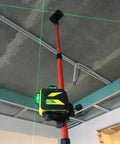 Telescoping Laser Pole With Adjustable 1/4-20 Mount For Rotary And Line Lasers, 13 Ft Extendable Aluminum Leveling Pole With Rotating Bracket And 5/8-11 Adapter, Heavy-Duty Mounting Accessory For Construction And Surveying, mounted with line laser indoors