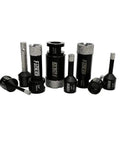 Assorted sizes of Pro Grade Diamond Drill Bit Set Tile Hole Saw Kit with core bits and adapters for porcelain tile, granite, and masonry.