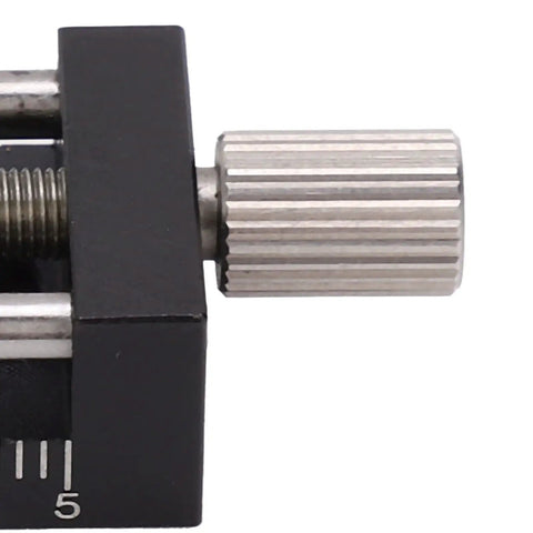 Close-up of micro tuning knob on Knockout Heavy Duty Manual Linear Actuator Stage for precise adjustments.