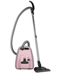 K Series Vacuum Maintenance Kit With Eight Filter Bags, Exhaust Filter And Pre Motor Microfilter beside pink vacuum cleaner