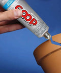 Applying All Purpose Glue 3.7oz Clear Bundle With Snip Tip Applicators And Spreader Tools to repair cracked terracotta pot