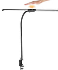 Person adjusting 3 In 1 LED Floor Lamp Desk Clamp On With Remote Control, featuring dimmable brightness and adjustable gooseneck, black color