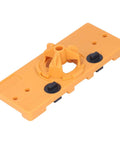 35mm hinge hole jig for woodworking, orange plastic base with black adjustment knobs