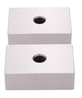 Two hardened steel 1x2x3 inch machinist blocks with centered through holes.