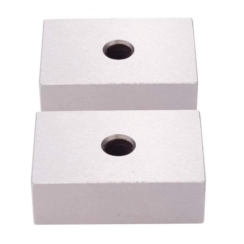 Two hardened steel 1x2x3 inch machinist blocks with centered through holes.