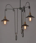 Kick Up Your Style With Adjustable Height Retractable Pulley System Vintage Black Metal Chandelier Ceiling Lamp kitchen view with three lights.