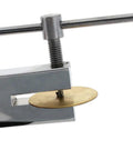 Dual Tip Hole Punch Tool 1.5mm And 2mm in use on metal sheet, pro grade for jewelry making, leather craft, and DIY projects.