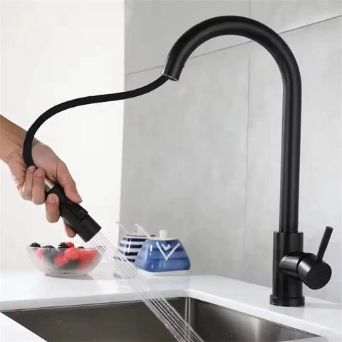 Black Pull Out Deck Mounted Flexible Hot Cold Stream Shower Modes Nozzle Faucet in use over a sink with water flow