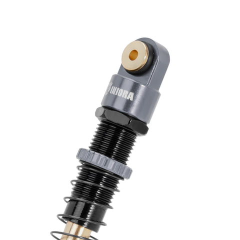 Close-up of 51mm Long Travel Shocks For Axial AX24 SCX24 RC Crawler, CNC machined aluminum, grey, threaded for upgrade