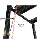 Hydraulic hose and air line for lock release on Weekend Warrior 4 Post Car Stack Lift, demonstrating safety features.
