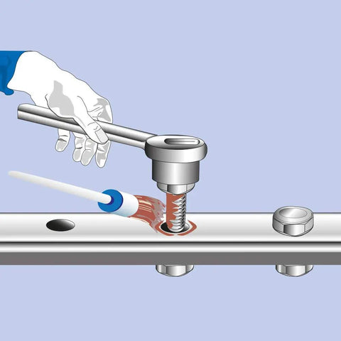 Applying Copper Paste Anti Seize Lubricant For High Temperature Applications to a metal bolt using a brush tool.