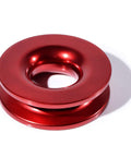 Red recovery ring from 4 Pack Green Synthetic Soft Shackles Rope With Protective Sleeve And 2 Red Recovery Rings Set for off-road use.