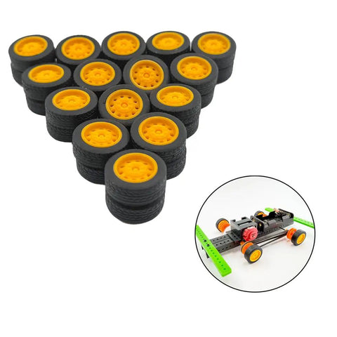 Triangle of wheels from Thirty Piece Small RC Car Wheel Set With Rubber Tires And 2mm Metal Axles 21mm Diameter Wheels Seven And A Half Millimeters Wide 100mm Shaft Length For RC Cars Trucks Robots Boats Helis And DIY Model Projects