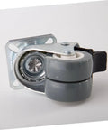 Heavy Duty Twin Wheel Swivel Casters With Locking Brake For Industrial Carts And Workbenches Bulletproof Steel Build close-up view