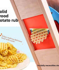 Manual stainless steel wave cutter with red housing and wooden frame for crinkle-cut potatoes and vegetables