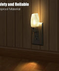 8 Pack Plug In Kid Friendly Night Light With Dusk To Dawn Sensor 2700K Warm White LED Nightlight in wooden wall outlet