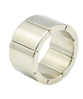 Front view of an eight-segment NdFeB magnet ring; silver with rectangular blocks, 36mm diameter, 20mm height