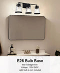 Black 3 Light Industrial Vanity Sconces With Hammered Glass Shades over mirror, vintage rustic farmhouse style bathroom lighting.