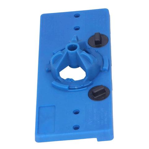 Front view of blue ABS hinge hole saw drilling guide jig; blue base with two black adjustment knobs