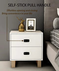 6 Pack Self Stick Cabinet Handles And Drawer Pulls With Adhesive, Drill Free Installation on white bedside table in modern bedroom.