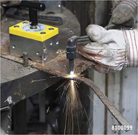 Welder using MagSquare magnetic welding clamp for precise alignment and strong hold in welding setup.