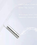 Stainless steel nozzle of Top Shelf Smart Bidet Toilet Seat With Self Cleaning Wand For Flawless Wash Performance showing water stream.
