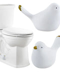 Ceramic Decorative Bird Shaped Toilet Bolt Covers 2 Pack Bathroom Hardware Upgrade Rust Free Standard Floor Mount Screw Caps next to white toilet.