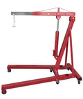 2 Ton Folding Engine Hoist And Heavy Duty Engine Crane Featuring Six Smooth Roll Swivel Wheels for easy lifting in garage.