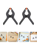 Top Tier Heavy Duty Spring Clamps Set For Woodworking And Photography Backdrops, Elastic Plastic Clips With Compact Design Great For Any Creative Project. Black plastic spring clamps set for wood and photo backdrops