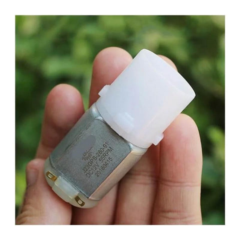 Small 280 Planetary Gearbox With Gear Brush Electronic Starter held in hand for DC Motors 6V 9V 12V 55 RPM Slow Speed Robotics Projects