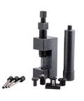 Tusk heavy-duty chain breaker rivet tool with threaded screw, black metal body and assorted pins.