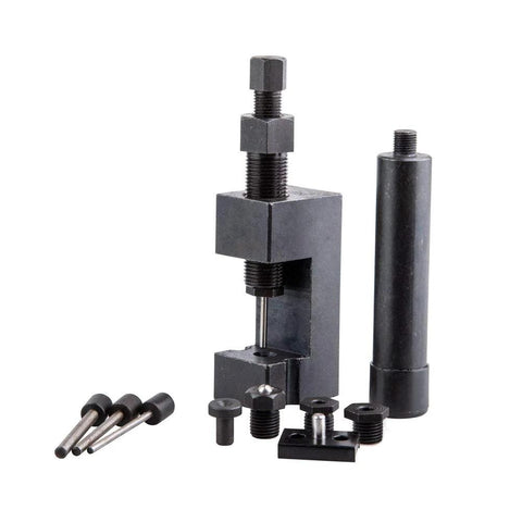 Tusk heavy-duty chain breaker rivet tool with threaded screw, black metal body and assorted pins.