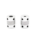 Two silver ReliaBot flexible shaft couplings, 5–8 mm bore, for NEMA 17 shaft and T8 lead screw