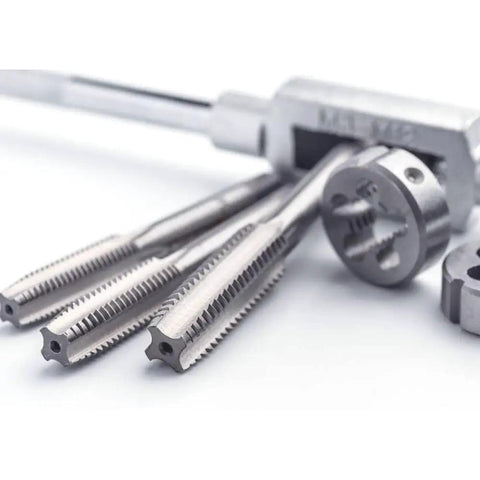 10 Piece Metric Tap Set For Clock And Watch Making, Hand Taps M1 To M3.5 on white surface, close-up of threading bits.