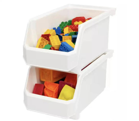 Set Of Six Crisp White Stackable Storage Bins Featuring Lockdown Grip Base And Crystal Clear Front Panels To Kick Pantry Chaos To The Curb And Tame Craft Tables with colorful building blocks.