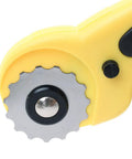 Close-up view of a yellow 45mm rotary cutter kit with 9 replacement blades for sewing fabric leather quilting and paper.
