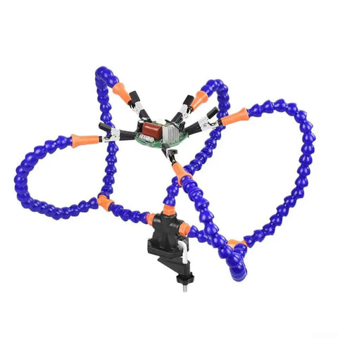 Adjustable Soldering Helping Hands Tool With 360 Degree Rotating Clips Bendable Metal Arms For Heat Resistant Clips And A Stable Secure Electronics Circuit Board Repair Setup holding a circuit board