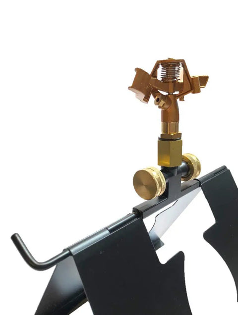 Serious Rooftop Fire Defense Sprinkler System That Stops Wildfire Embers Cold with a compact black base and gold sprinkler head.