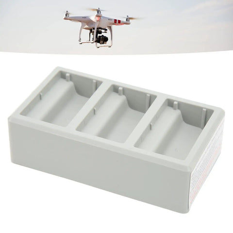 Fast Drone Battery Charging Station 3 Way Hub For Mini 3 Pro And Mini 3 Drones with empty slots, shown with flying drone.