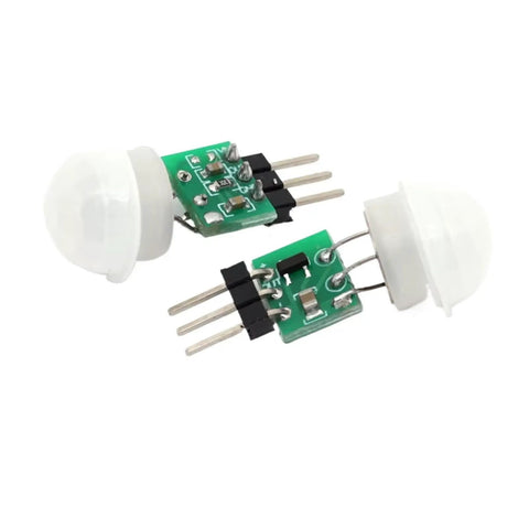Mini PIR Motion Sensor Module AM312 Infrared Human Detection Low Power Ultra Low Current With Wide Voltage 2.7 To 12V Slick For Smart Home Do It Yourself Projects And Robotic Builds, close-up on white background