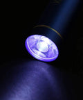 Flux Repair Kit With Light Curing Liquid No Clean Flux For PCB BGA Boards flashlight illuminating surface