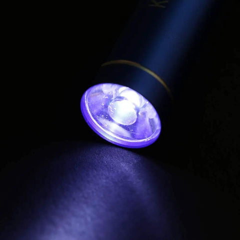 Flux Repair Kit With Light Curing Liquid No Clean Flux For PCB BGA Boards flashlight illuminating surface